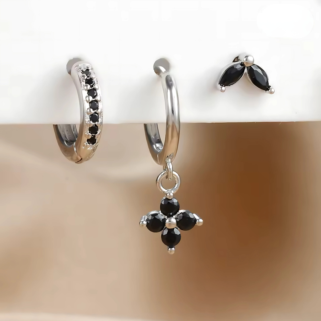 Ensemble Ohrringe und Piercings – Vielseitigkeit und subtile Brillanz 