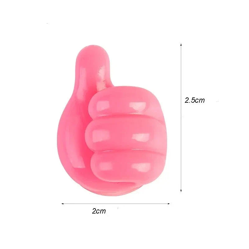 Thumbmate ™ - Creative wall hook in self -adhesive silicone